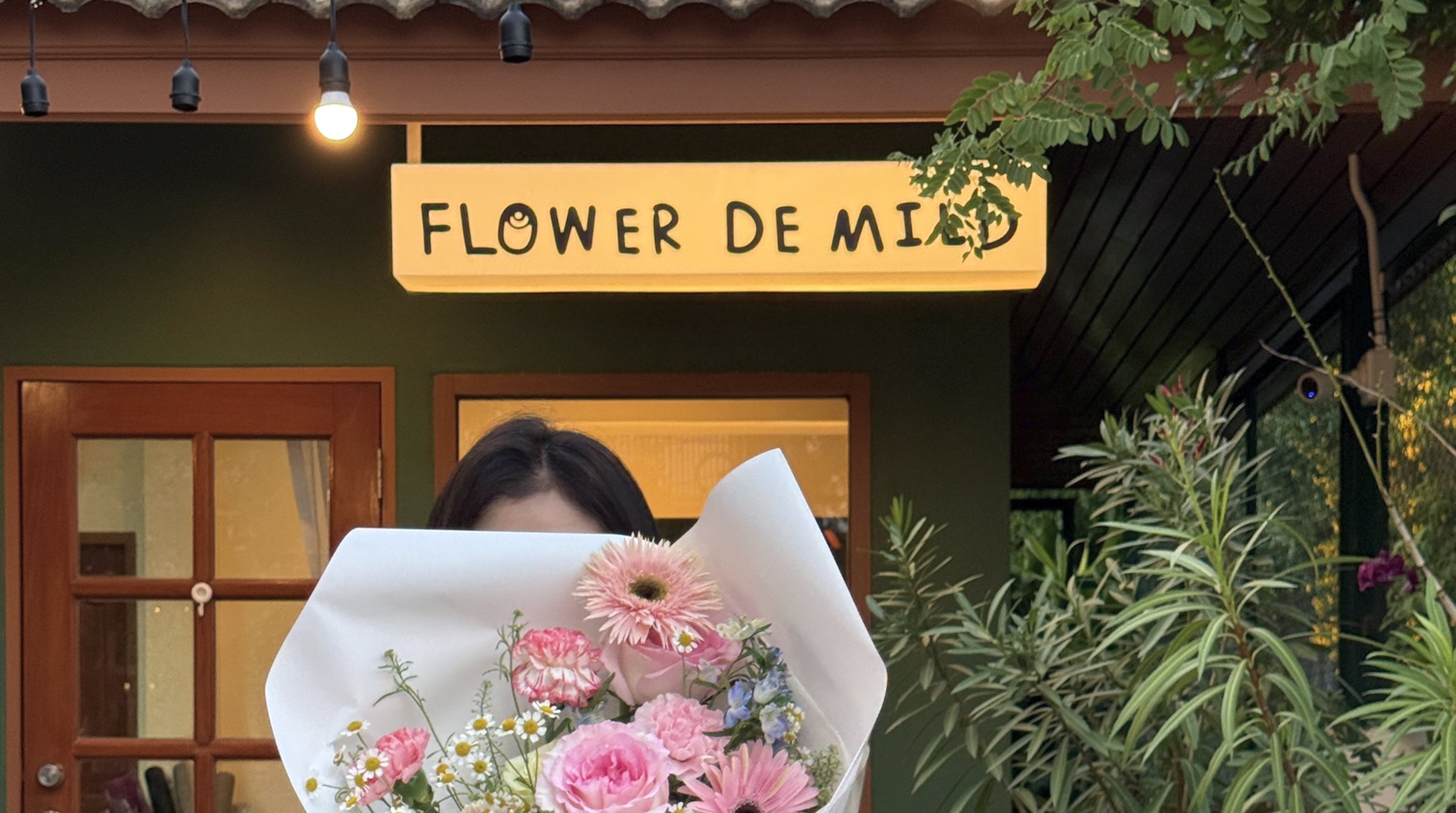 The Verelle shop, a blush plaster room full of buckets of flowers
